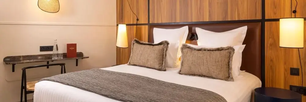 A guest room at H&ocirc;tel Toujours