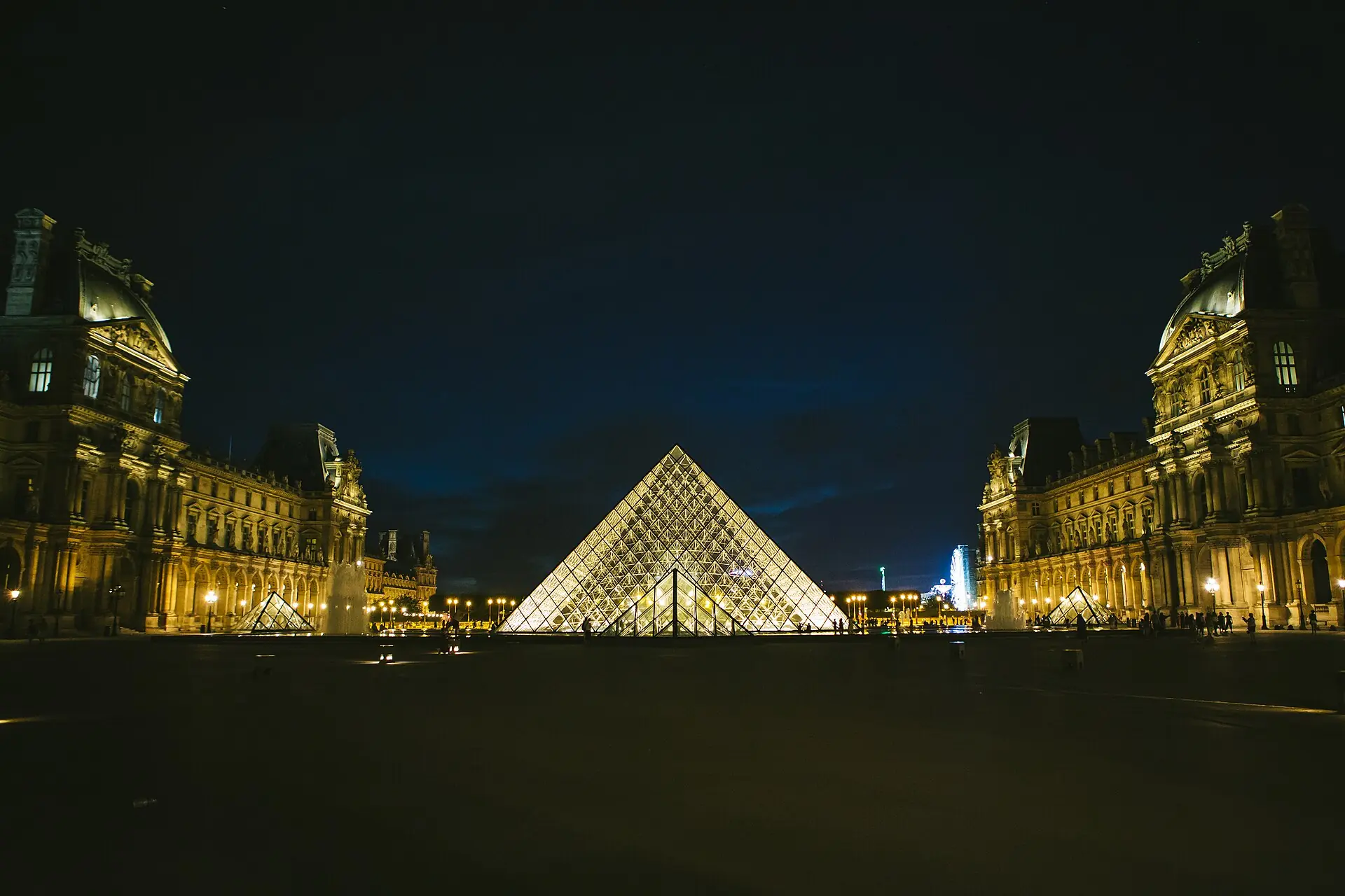 The Louvre pyramid at night