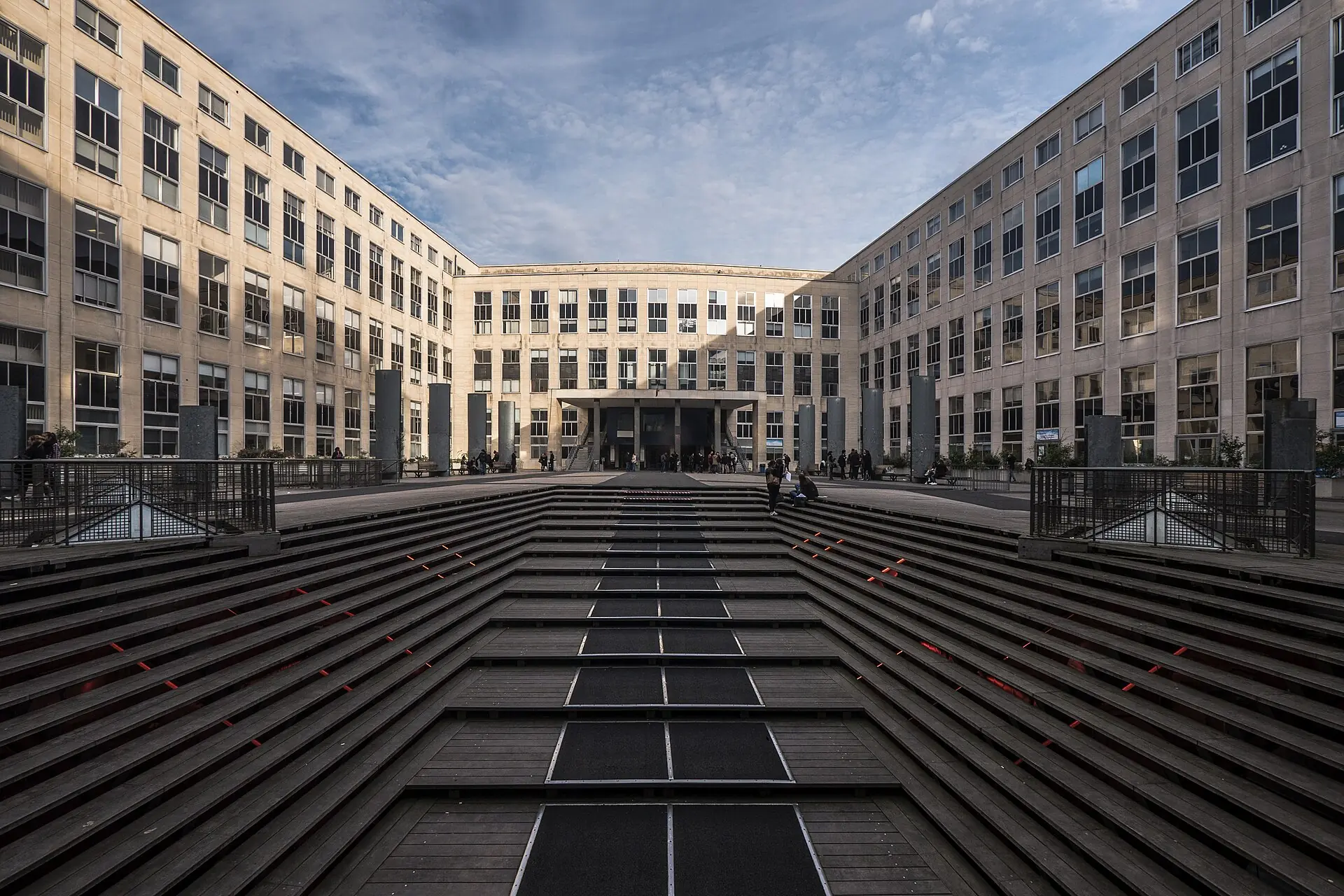 The concrete courtyard and stepped terraces of Universite Paris Dauphine